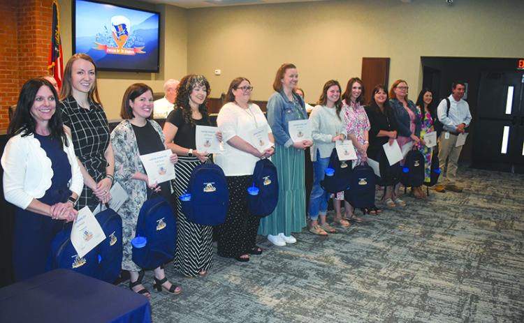 The Board of Education honored the 2024 graduates of the Leadership Academy on Monday night. Shown are (from left) Pam Threlkeld, Claire Steverson, Keylia Patton, Gisela McGugan, Dora Lucas, April LaHayne, Melanie Jackson, Ashley Ivester, Kristy Hallford, Stacey Gailey, Lauren Fair and Ben Bolton. MATTHEW OSBORNE/Staff