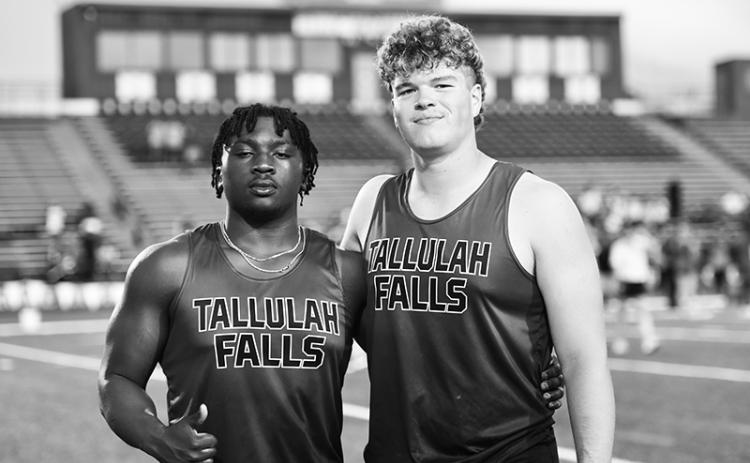 Tallulah Falls track athletes Ade Akisanya (left) and Sam Ketch take a minute to reflect during the state meet. SCOTT NEAL/Submitted