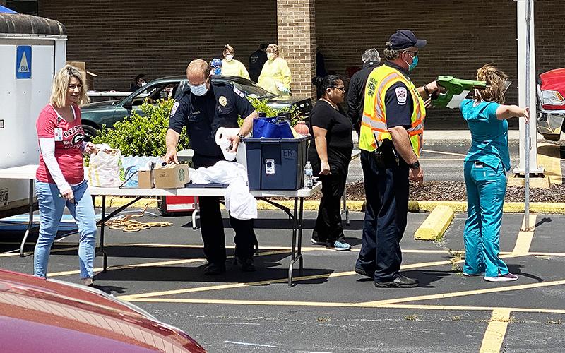 Habersham Medical Center personnel and county first responders held a drive-through COVID-19 testing event in Cornelia on Sunday. CODY ROGERS/Staff