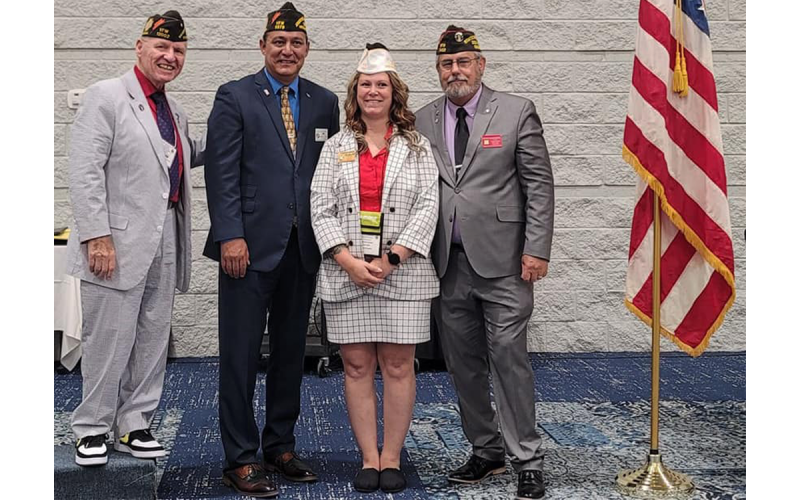 A Facebook photo posted from a state convention by VFW District 2 on June 27 appears to show  Gabrielle Beutler (second from right) having the use of both of her  natural legs. She claimed in a news  report to have lost a leg in an explosion in Afghanistan. VFW DISTRICT 2 FACEBOOK