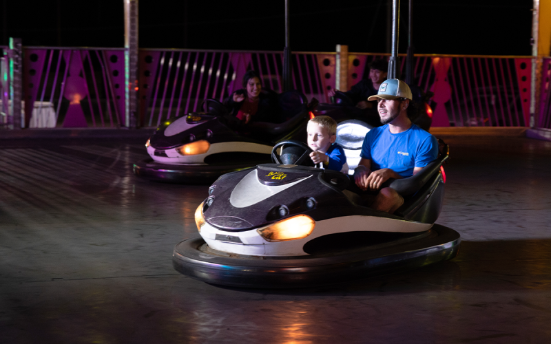 Kevin Rylee gets driven by his son in a bumper car during a fun night with his family. ZACH TAYLOR/Special