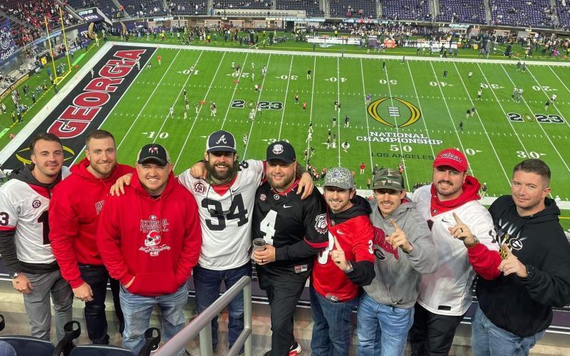 Jeremy Perry (second from left) and the crew at United Roofing enjoyed the national championship game together. Shown are (from left) Cody Mixon, Perry, Jordan Lovell, Devin Welborn, Nathan Thieme, Drey Loggins, Trent Wall, Drew Bryant and Justin Rochester. JEREMY PERRY/Submitted