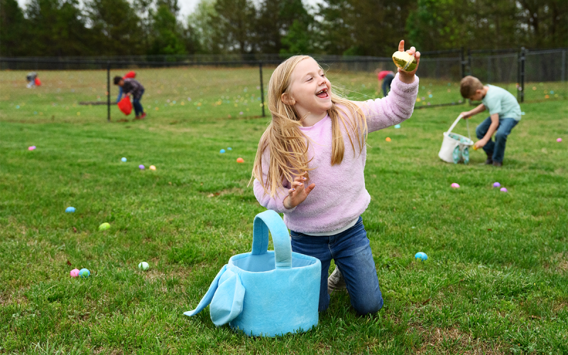 Lilly  Chambers has her “golden egg” moment during the Easter egg hunt on Good Friday. ZACH TAYLOR/Special
