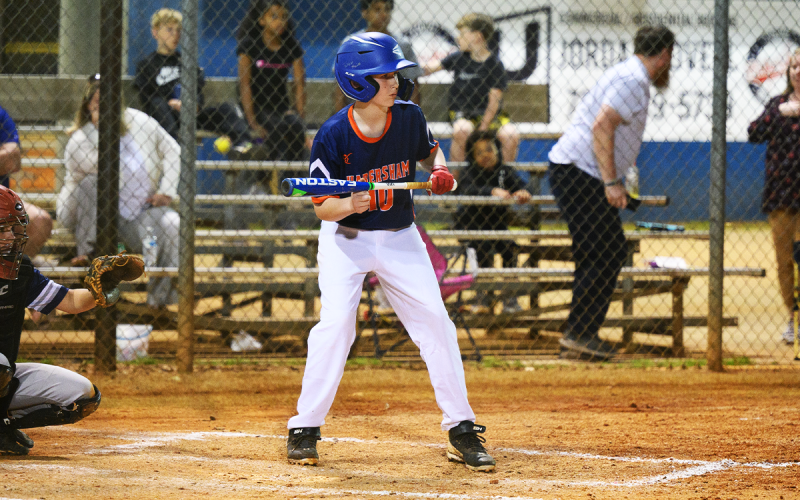 Titan Fain goes for a bunt with a runner on third in a Habersham County 12U game.  ZACH TAYLOR/Special