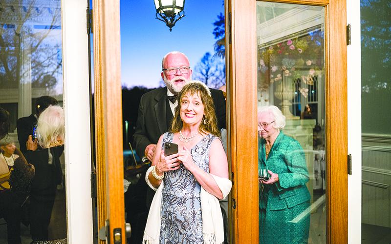 E. Lane Gresham and her husband Bill smile as they enter the Charm House. ZACH TAYLOR/Special