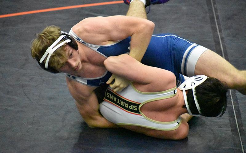 Habersham Central’s Justin Whitney, shown battling in the Raider Invitational earlier this year, will make his third trip to Macon for the state wrestling tournament. MATTHEW OSBORNE/Staff