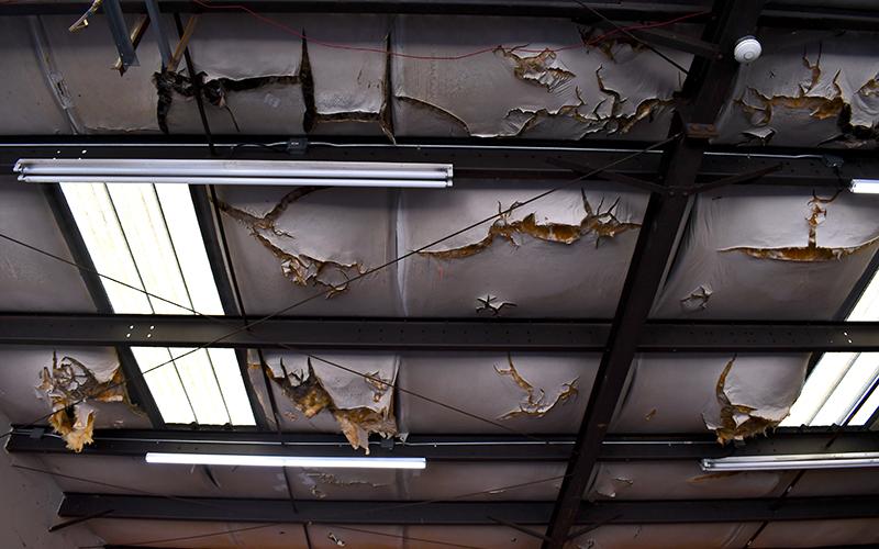 Ceilings in the apparatus bay at  Station 12 on  Duncan Bridge Road are falling apart. This type of  disrepair is a scene  common to stations around the county. JULIANNE AKERS/Staff