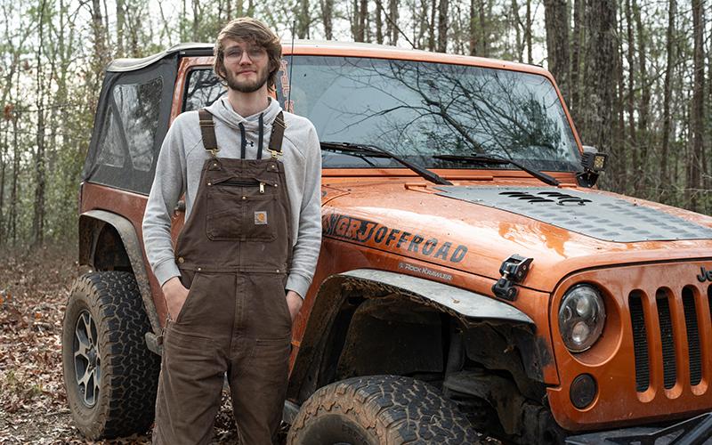 Blake Dover stands beside his jeep on an undesignated trail in Habersham County. ZACH TAYLOR/Special