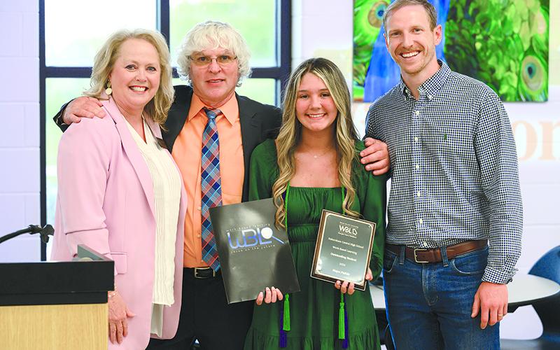 State WBL Program Specialist Laura Boswell stands with Habersham Central WBL Program Instructor Morris Brooks, Outstanding WBL Student Award winner Maya Pulido, and Pulido’s manager, Hayden Black of Tim’s Pharmacy. ZACH TAYLOR/Special
