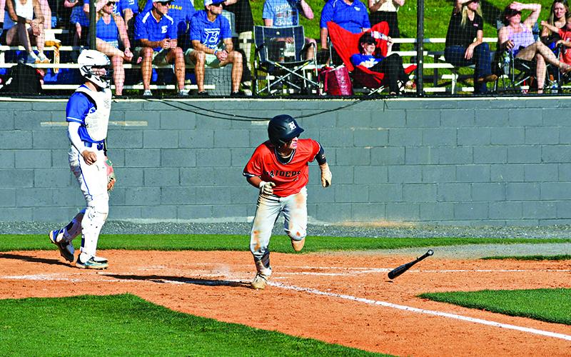Maverick Chitwood busts it out of the batters box after grounding into a fielder’s choice  during Wednesday’s playoff game at Etowah. LANG STOREY/Staff