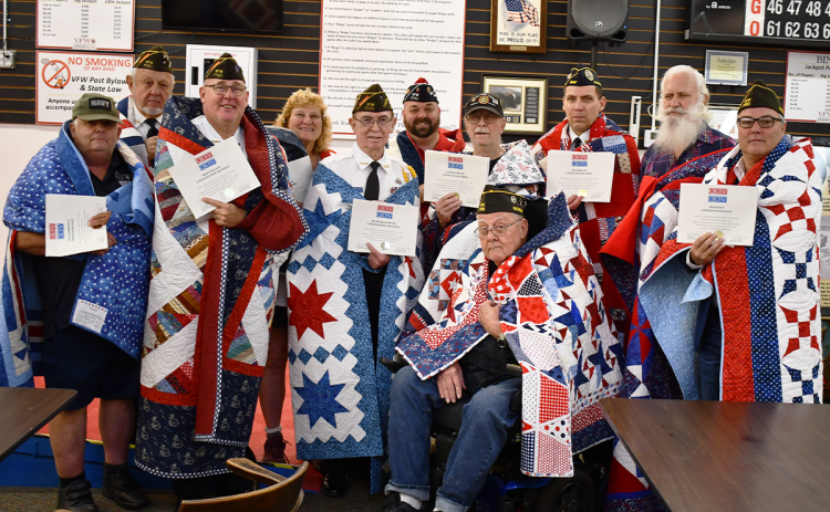 Honorees included (from left) Daniel Vanderstelt, Barry Church, Rob Wallace, Connie Barrow, Bill McAllister, Michael Dale, James Marach, Charlie Potter (seated), Jim Morgan, Clarence G. Mason, and Mack Key. MATTHEW OSBORNE/Staff