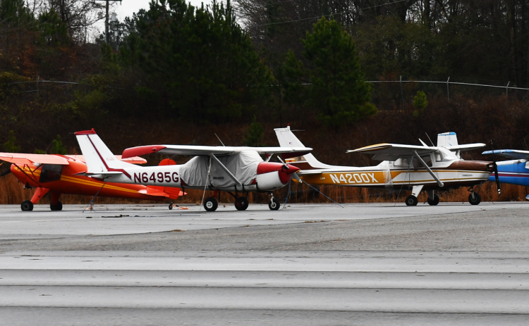Aircraft at the Habersham County Airport will have new homes after the construction of 20 new hangars are finished. JOHN DILLS/Staff