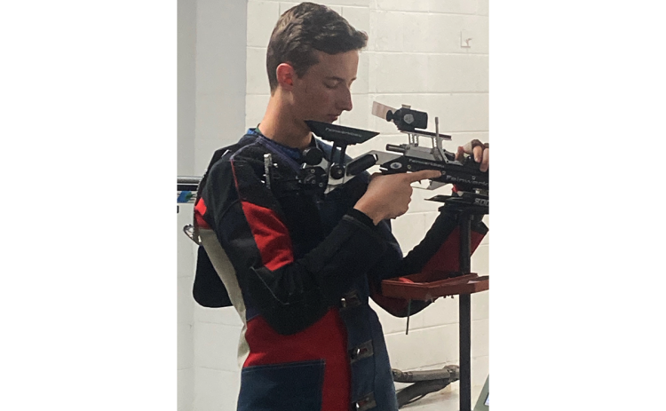 Tallulah Falls junior Joseph McGahee tends to his weapon during a rifle meet. TIM STAMEY/Submitted 