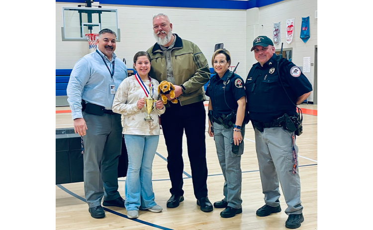 Shown are Habersham County Schools Director of Safety, Murray Kogod, Bella, Sheriff Joey Terrell, Gonzalez, and SRO David Jackels. KELLY BANKS/Submitted