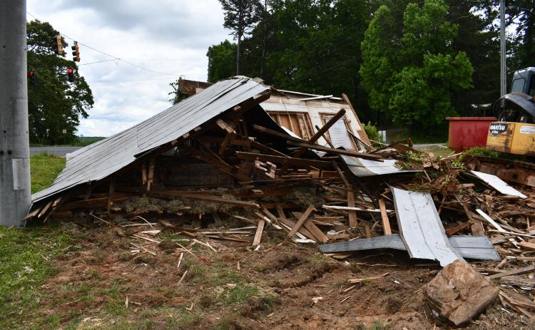The remains of Mud Creek Grocery were seen Wednesday near the intersection with Duncan Bridge Road. The building was rotting and falling apart, and the decision was made to tear it down. MATTHEW OSBORNE/Staff
