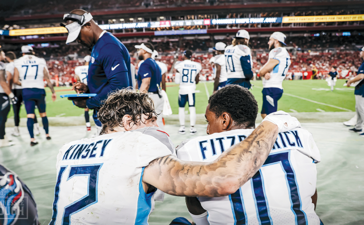 Tennessee Titan Mason Kinsey talks with teammate Dez Fitzpatrick during a 2021 preseason game. PHOTO COURTESY OF TENNESSEE TITANS