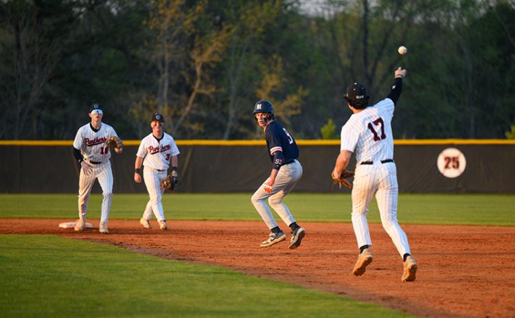 Habersham Central pitcher Konnor Burrell gets in a pickle while trying to steal second against Jackson County on Wednesday evening On the mound, Burrell pitched four innings before being relieved by Kaleb Chastain. ZACH TAYLOR/Special