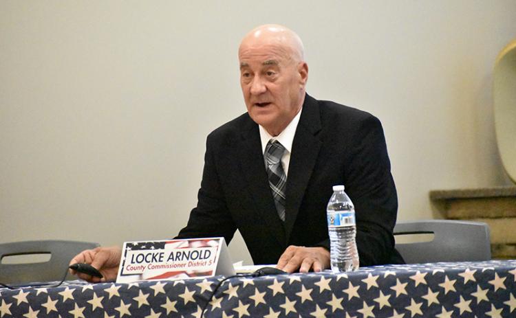 Locke Arnold speaks at the Farm Bureau political forum.