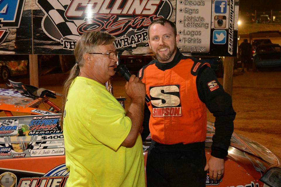 Jule Coffee interviews winning driver Harley Holden at the Toccoa Raceway after a race. Coffee has been interviewing drivers in Toccoa Raceway's victory lane for about 15 years. (Submitted photo)