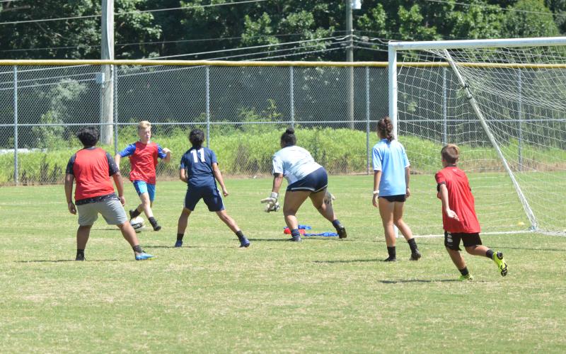 Campers scrimmage at the Future Raiders Soccer Camp Wednesday. (Zack Lee/Staff)