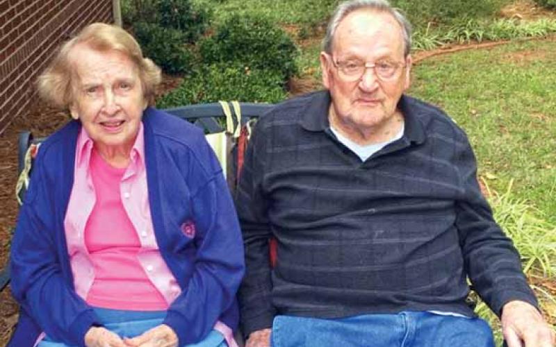 Paul Reeves, right, is shown sitting with his wife, Doris.