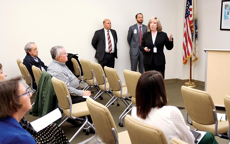 Habersham Medical Center CEO Lynn Boggs addresses the audience during the Monday evening public forum in which about 40 people attended. Behind her are from left, HMC Chief Financial Officer Steve Ciampa and HMC Vice President of Strategy, Business Development and Governmental Relations Tyler Williams.