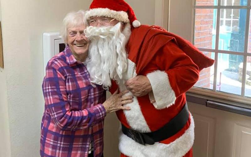 Various police and fire agencies spread holiday cheer by handing out gifts to residents at Habersham Retreat.