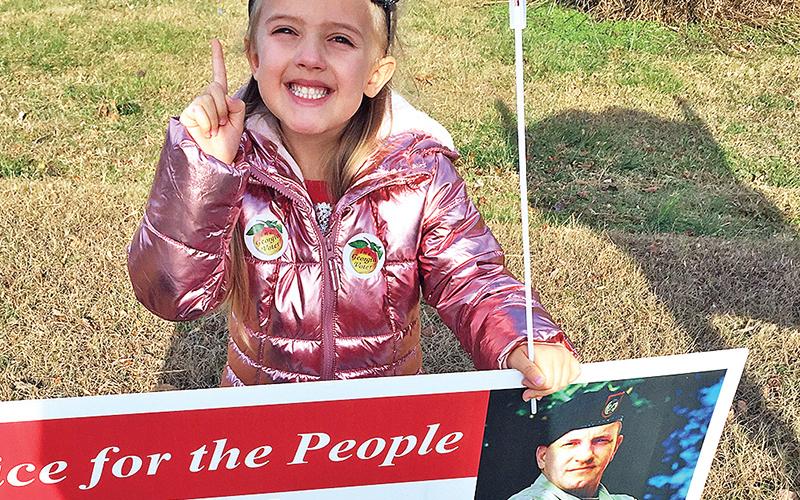 Rebekah Grace Dotson accompanied her grandparents, Glenda and Dywane Dotson of Baldwin, to the polls Tuesday in Cornelia.