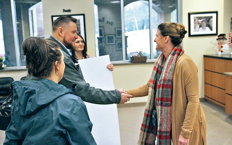 Laura Anderson, Josh Anderson and Angie  Wingo with North Georgia Home Group meet with Fairview Elementary School Principal Jennifer Chitwood to present a check to pay off the outstanding lunch balances for students.
