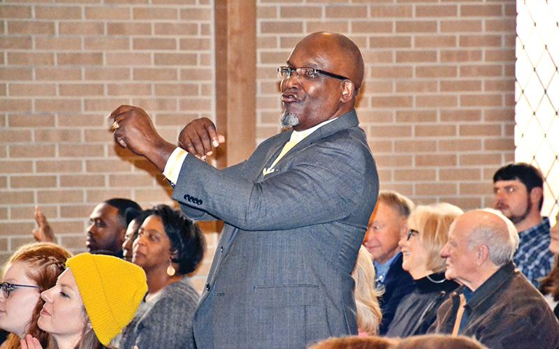 Bishop Ernest Burns dances to the spiritual music presented at Sunday’s Alliance for African American Music festival.