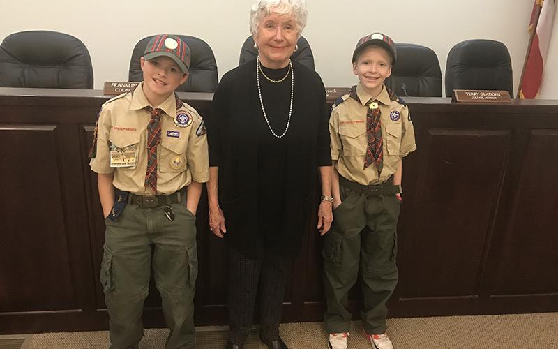 Clarkesville Pack 5 Cub Scouts Finn Jackson (left) and Zachary Klemm met with Clarkesville Mayor Barrie Aycock before and after Monday’s city council meeting to learn about government for their Arrow of Light requirement.