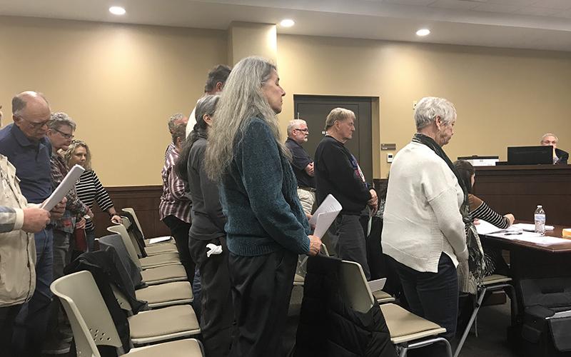 Residents of the Echota/Stonebank Road neighborhood stood in support as their petition to deny a local wedding venue from opening there was read Monday night at the Habersham County Board of Commissioners meeting.