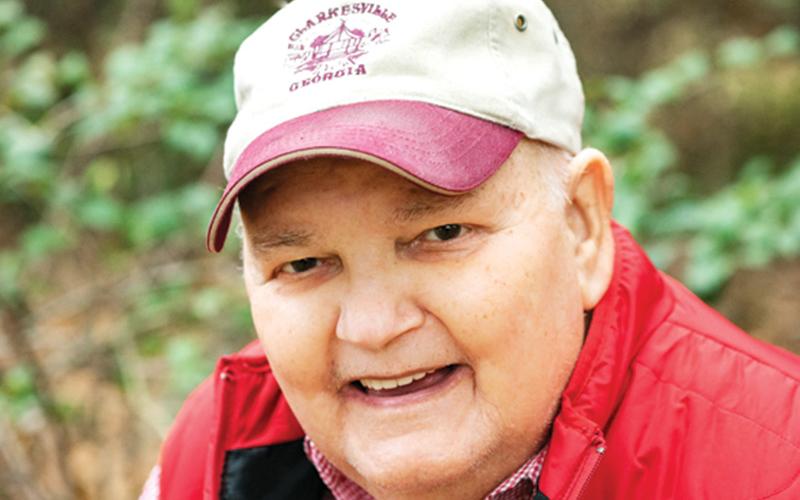 At a family photo shoot in November, Sam Tolbert wanted to have his photo made in his Clarkesville cap. “I think his smile says it all,” said longtime friend Lane Gresham.
