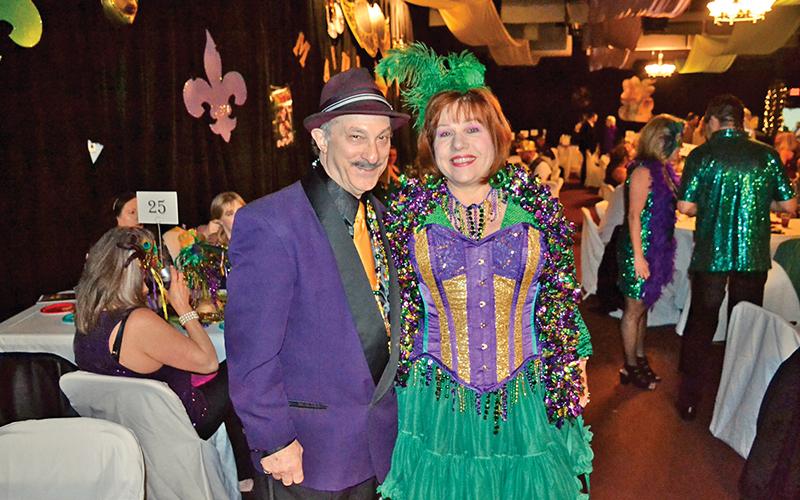 Jon Schwartz and Ginny King came to the Clarkesville Mardi Gras with plenty of flair.