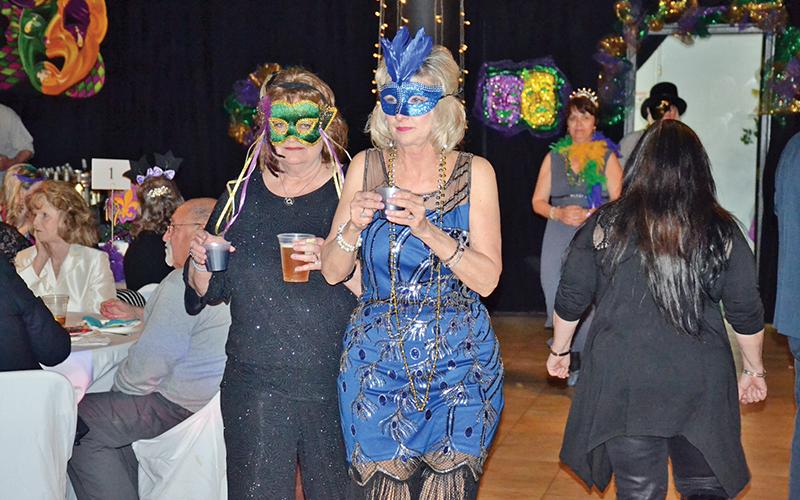 With everyone wearing masks, you did not know who was next to you on the dance floor most of the time Saturday night.