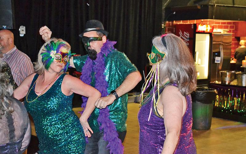 Once dinner was over, the masked patrons took over the dance floor and partied the night away.