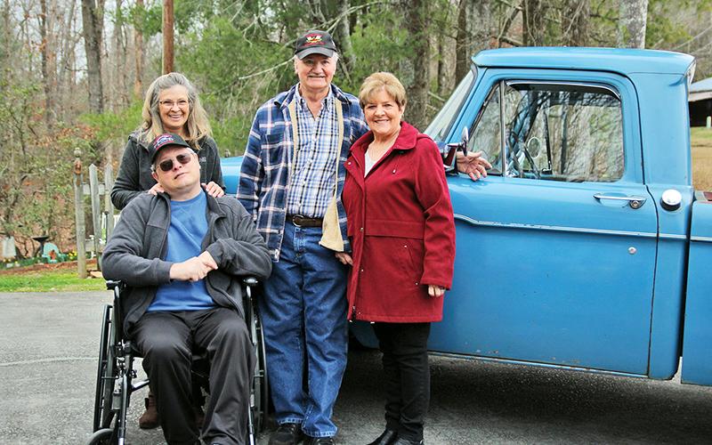 Gathering Sunday are (from left) June Waters, Jimmy Waters, Donald Allen and Judy Allen, Jimmy’s second cousin. Donald refurbished the 1966 Ford pickup for his friend.