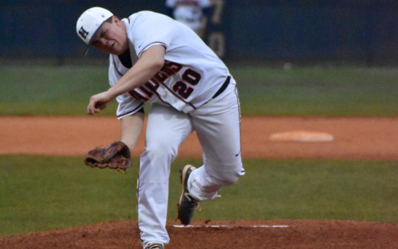 Habersham Central's Hunter Tatum (20) throws a pitch during the first inning of the Raiders' 11-1 loss to Chestatee High School Wednesday.