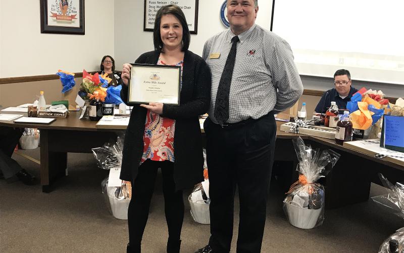 The Habersham County Board of Education Extra Mile Award for March went to counselor Natalie Ziemba of the Habersham Success Academy. Ziemba was instrumental in planning a life skills day – also called “Adulting Day” – for her students, which taught them everything from cooking to car maintenance to sewing and financial planning. Ziemba recruited volunteers and presenters to teach the kids the skills they said were lacking in the normal curriculum. Ziemba got her award from board member Doug Westmoreland.