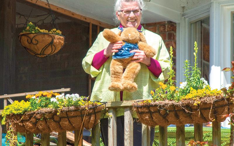 Artist and author Jan Walker holds the stuffed rabbit she has displayed at her house on Chambers Avenue in the Tower Mountain neighborhood of Cornelia. Walker also has two stuffed cats displayed as part of the neighborhood’s “bear hunt,” which is an effort to give children something to do while “sheltering in place” during the coronavirus pandemic.