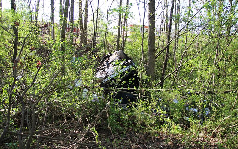 The vehicle landed deep in the woods by State Route 365 southbound.