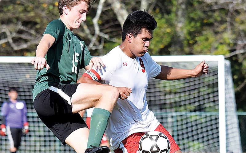 Tallulah Falls’ Joe Griswold of Demorest (left) battles a Franklin player during a game last season.