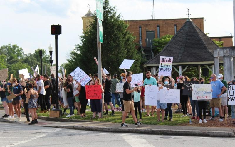 Hundreds gathered in Clarkesville on Friday night for a demonstration of unity.
