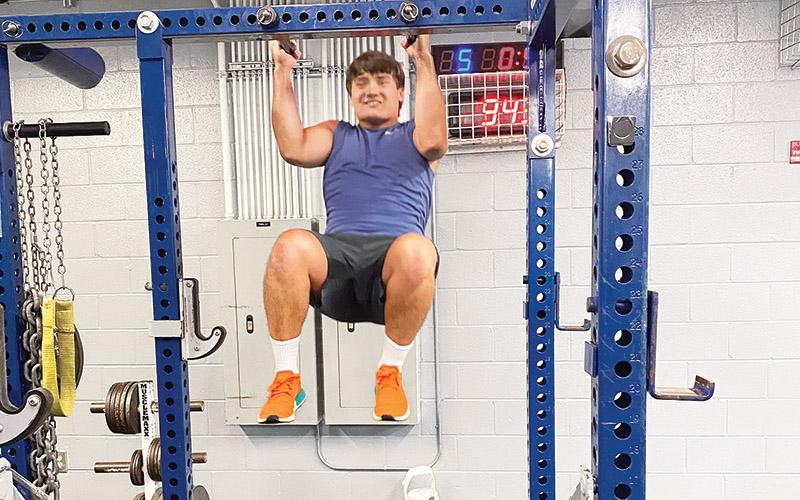 Habersham Central’s Tanner Wade gets some pull-ups in as part of a workout earlier this week.