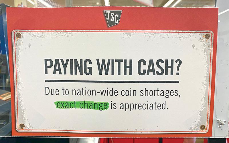 A sign at Tractor Supply in Cornelia lets folks know they are short on change.