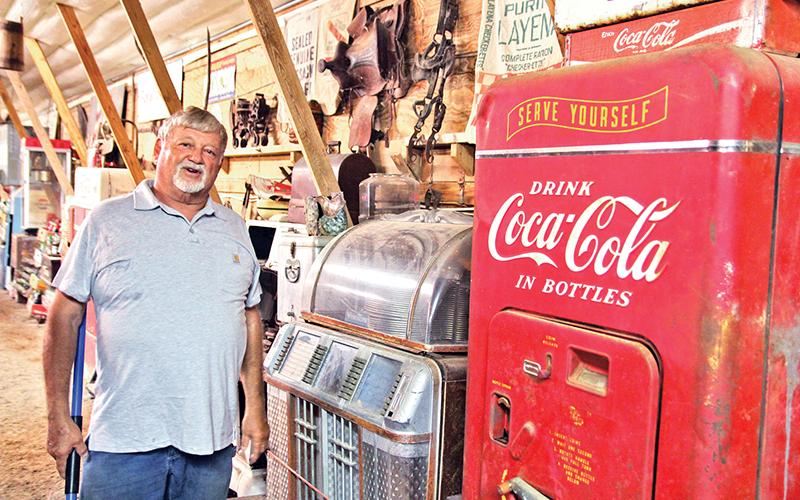 Bobby Irvin gives a tour of the chicken coop he converted in a bluegrass venue which has hosted several local and recognizable names in bluegrass music.