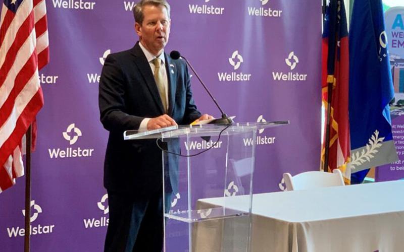 Gov. Brian Kemp speaks at a news conference Thursday.