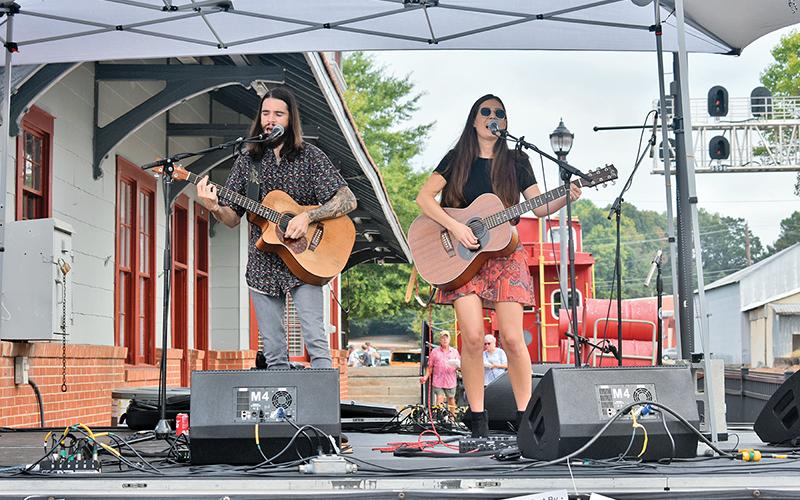“Leaving Lennox” with Mick Hambly and Lauren Val played last year at the Big Red Apple Festival in Cornelia. There will be no singing and revelry in the downtowns of Cornelia or Clarkesville this fall, as both the Big Red Apple Festival and the Mountain Laurel Festival have been canceled due to concerns over the continuing COVID-19 pandemic.