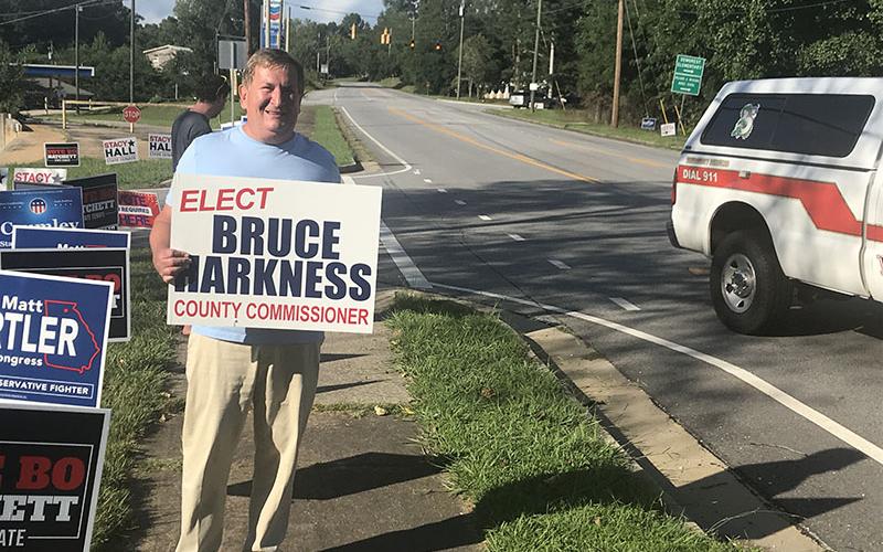 Bruce Harkness was stumping for himself in Demorest right up until polls closed Tuesday night. He will represent District 4 starting in January.