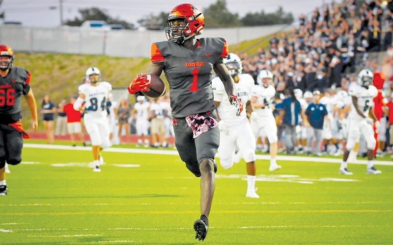 Habersham Central’s Josh Pickett takes it in for a touchdown during a game last season. Pickett was tapped for Sports Illustrated’s All-American watch list for 2020.